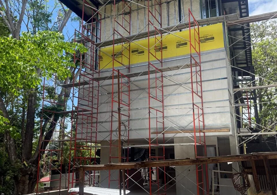 Three-story structure of Villas 5 and 6 at Manuel Antonio Tree House Villas during finishing phase